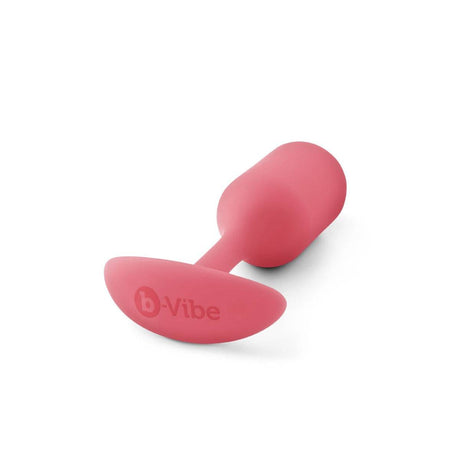 b-Vibe Snug Plug 2 Weighted Silicone Butt Plug Coral - Simply Pleasure