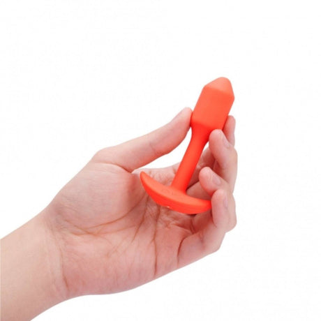 b-Vibe Snug Plug 1 Vibrating Weighted Silicone Butt Plug Orange - Simply Pleasure